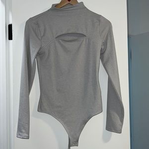 Express bodysuit with cut out